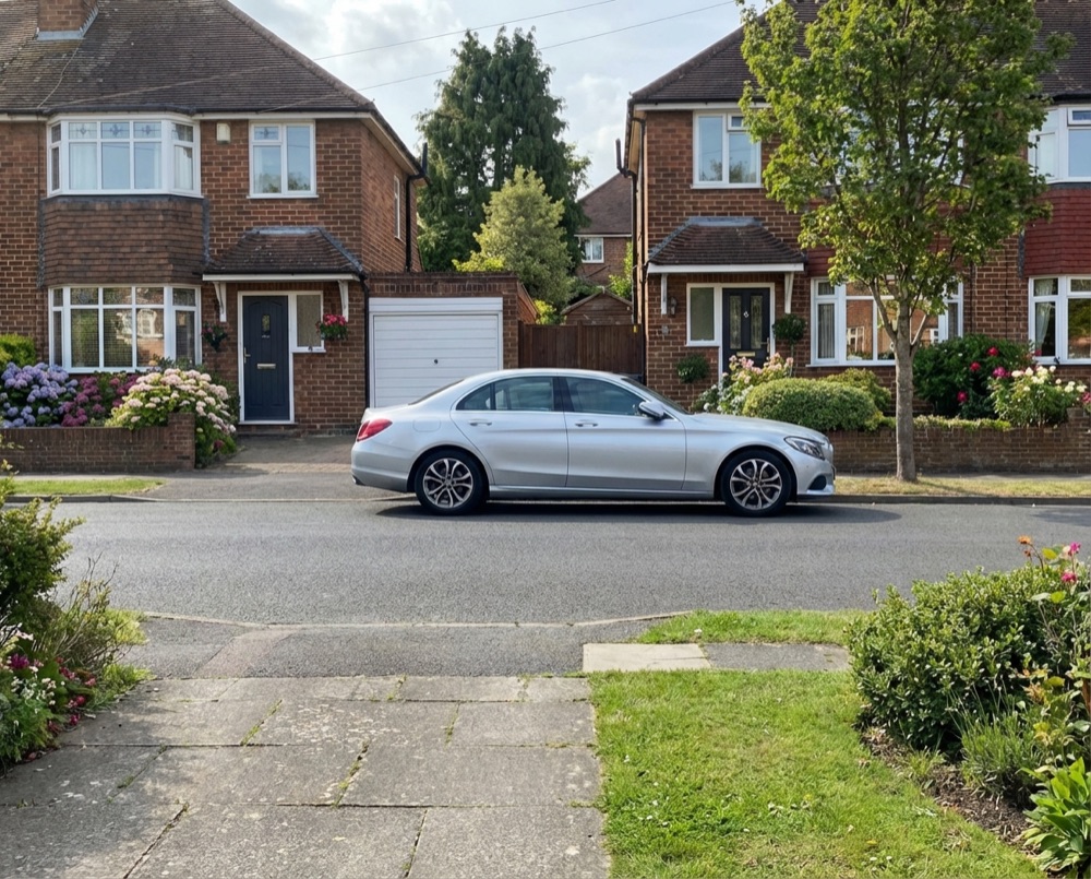 Residential street in Chichester with wheelie bins